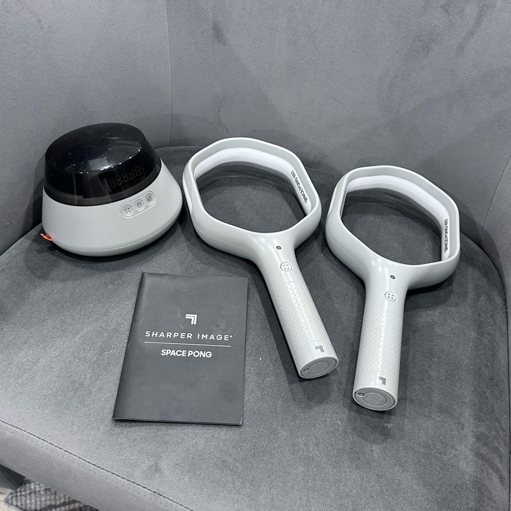Space pong sharper image game